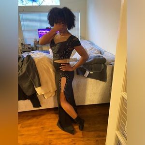 Looking for an upcoming Black Prom Dress with pearls and sheer! Size small.